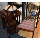 An Edwardian mahogany inlaid nursing chair, 83cm high, also with a folding cake stand,