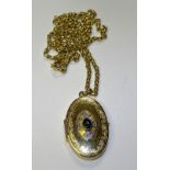 A 9ct gold sapphire and diamond locket, on brick link chain,
