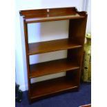 A mahogany open bookcase,