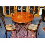 A set of four Edwardian mahogany parlour chairs, with serpentine front, raised on sabre supports,