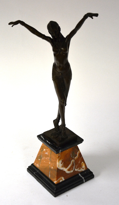 A contemporary Art Deco style French bronze figure, depicting a semi-clad lady in an elegant pose,