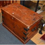 A vintage pine and metal bound blanket box, with hinged lid and metal carry handles,