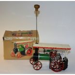 A Mamod toy steam tractor, in original fitted box, decorated in cream, red and green,