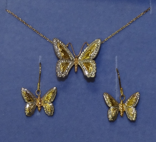 A 9ct yellow and white gold butterfly pendant and earring set, 375 stamped to clasp, 1.