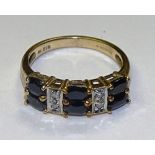 A 9ct gold sapphire and diamond ring,