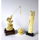 Two ivory style figures on stands,