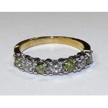 A 9ct gold seven stone diamond ring,