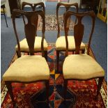 A set of four mahogany inlaid parlour chairs, raised on tapering supports with spade feet,