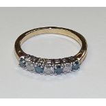 A 9ct gold seven stone diamond ring,