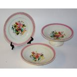 A porcelain fruit set, decorated with floral panel and pink border, 21.