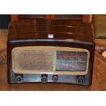 A 1930/40's Cossor Melody Maker wireless radio, in brown with cream speaker and dial,