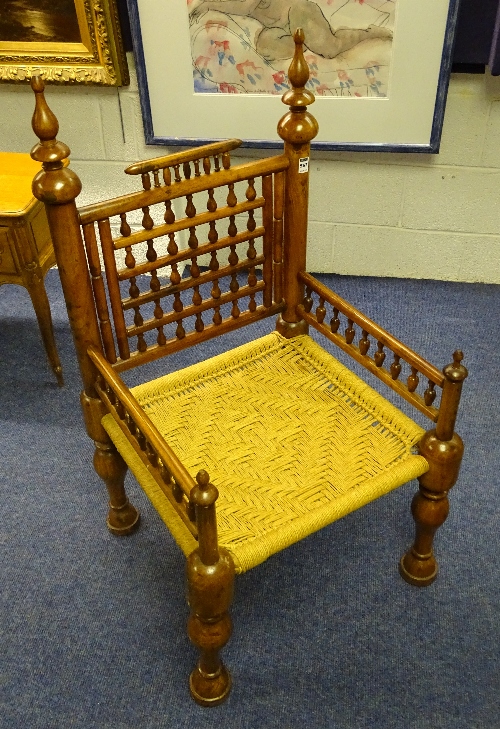 An Anglo style hardwood armchair, with woven rush seat,