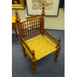 An Anglo style hardwood armchair, with woven rush seat,