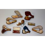 A collection of Meerschaum pipes and cheroot holders,