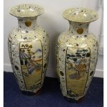 A pair of Satsuma floor standing pottery vases,