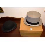 A grey felt top hat by Christys' London, with black felt band to base and leather seam to interior,