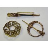 Two 9ct gold Celtic brooches, both stamped 375 to underside, (one with broken pin), 10.