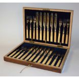 A set of 12 plated fish knives and forks with bone handles,