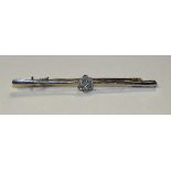 A white and yellow metal diamond flowerhead bar brooch,