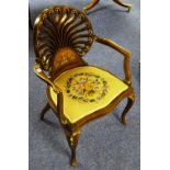 An Edwardian mahogany inlaid salon chair, with wheel back,