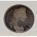 A William III 1694-1702 shilling, with laureate and dated bust to obverse,