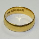 A 22ct gold wedding band, stamped 22 to inside, ring size P, 6.