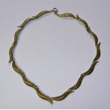 A 9ct gold leaf motif necklace, each leaf link stamped 375, 39cm long (unfastened), 25.