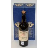 A 1955 Finest Reserve bottle of vintage port wine by W & J Graham & Co, with wax cover,