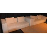 A pair of contemporary fabric covered two seater sofas, 64cm high x 205cm wide,