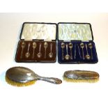 Two boxed sets of Walker and Hall silver teaspoons, hallmarks for Sheffield 1924 and 1925,