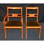 A set of eight reproduction dining chairs, including two carvers,