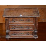 A vintage oak apprentice type chest of drawers, with three drawers,