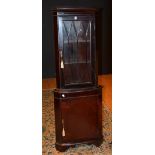 Two reproduction corner cabinets, one with glazed door,