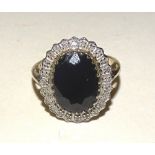 A 9ct gold sapphire and diamond ring,