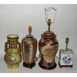 Three modern Chinese pottery table lamps with shades, various sizes,