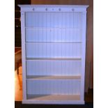 A large painted pine open bookcase, 214cm high x 148cm wide x 33.
