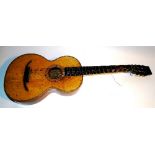 A romantic acoustic guitar circa late 19th/early 20th century, (one string a/f),