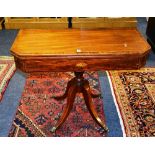 A 19th century fold over tea table with rosewood banding,