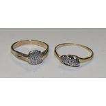 An 18ct gold and platinum three stone diamond ring, stamped 18ct, ring size P, 1.