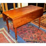 A Victorian Pembroke table, with drawer to one end, raised on ceramic castors,