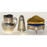 A Garrards silver pepper pot, of stylized foliate design with squirrel crest to cartouche,