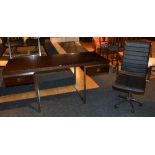 A contemporary hardwood office desk, 76cm high x 160cm wide x 70cm deep, also with a swivel chair,