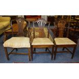 A set of seven matching George III style dining chairs, comprising six side chairs and one carver,