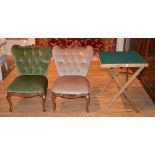 A pair of reproduction gossip chairs, upholstered in green and pink buttonback velour, 79cm high,