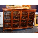 A mahogany four door breakfront bookcase,