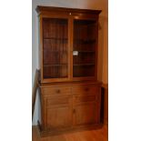 A mahogany bookcase on cupboard chest circa early 20th century,