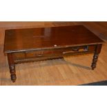 A modern mahogany coffee table, with two small drawers,