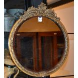 A gilt framed circular wall mirror,