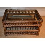 A wicker conservatory coffee table, with glass top,