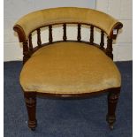 A Victorian mahogany library armchair, the horseshoe frame with balustrade decoration,